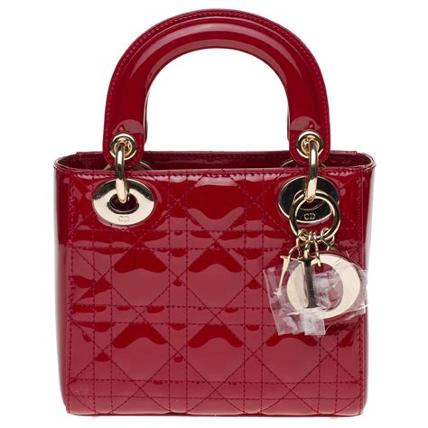 dior red pouch|Dior cherry red leather bag.